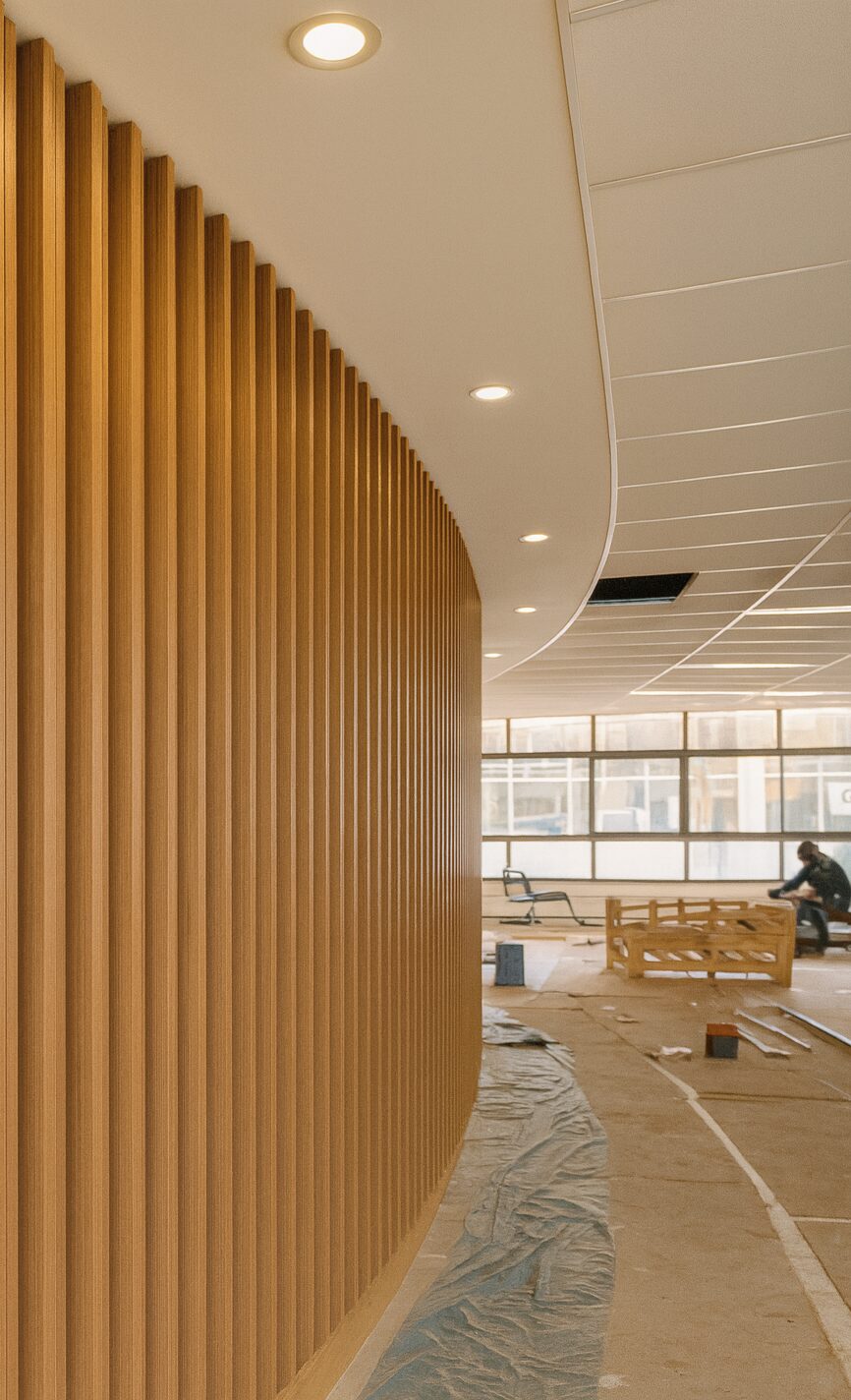 Curved slatted wall in an office