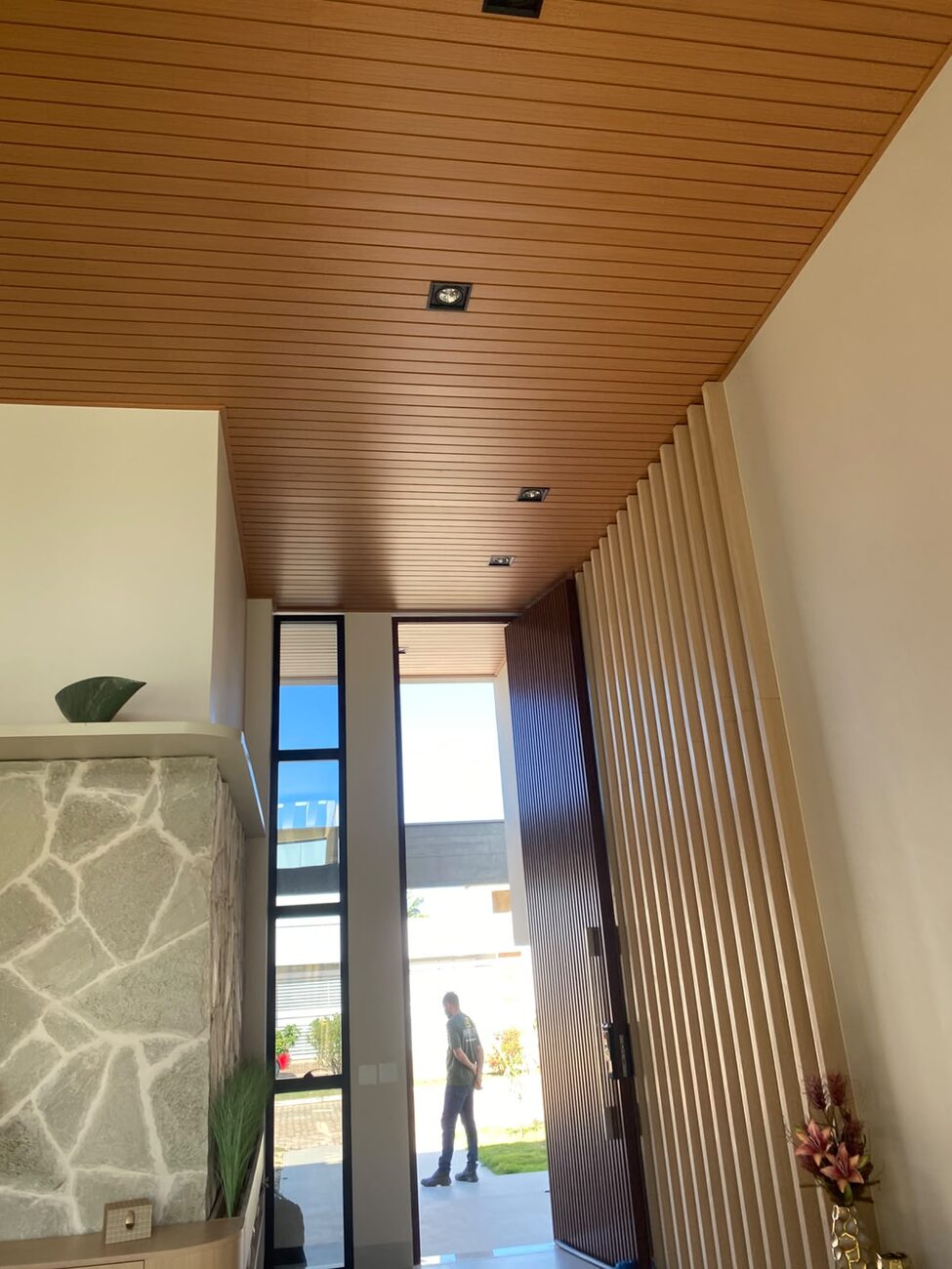 Hall with paneling and slats