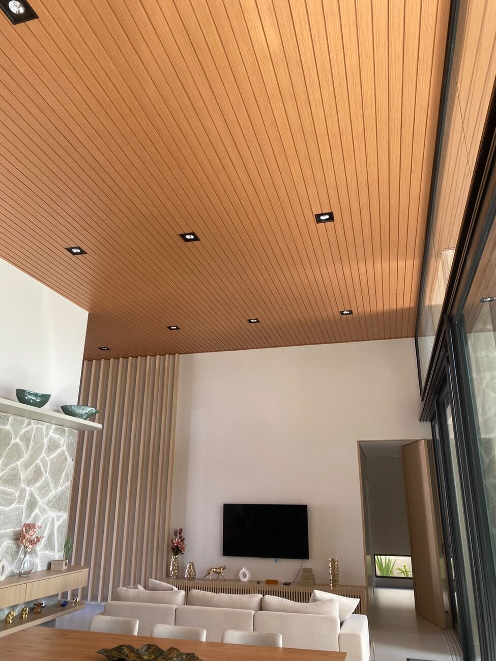 Living room with paneled ceiling