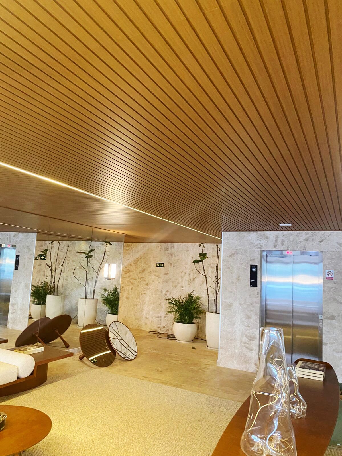 Slatted ceiling with recessed lighting