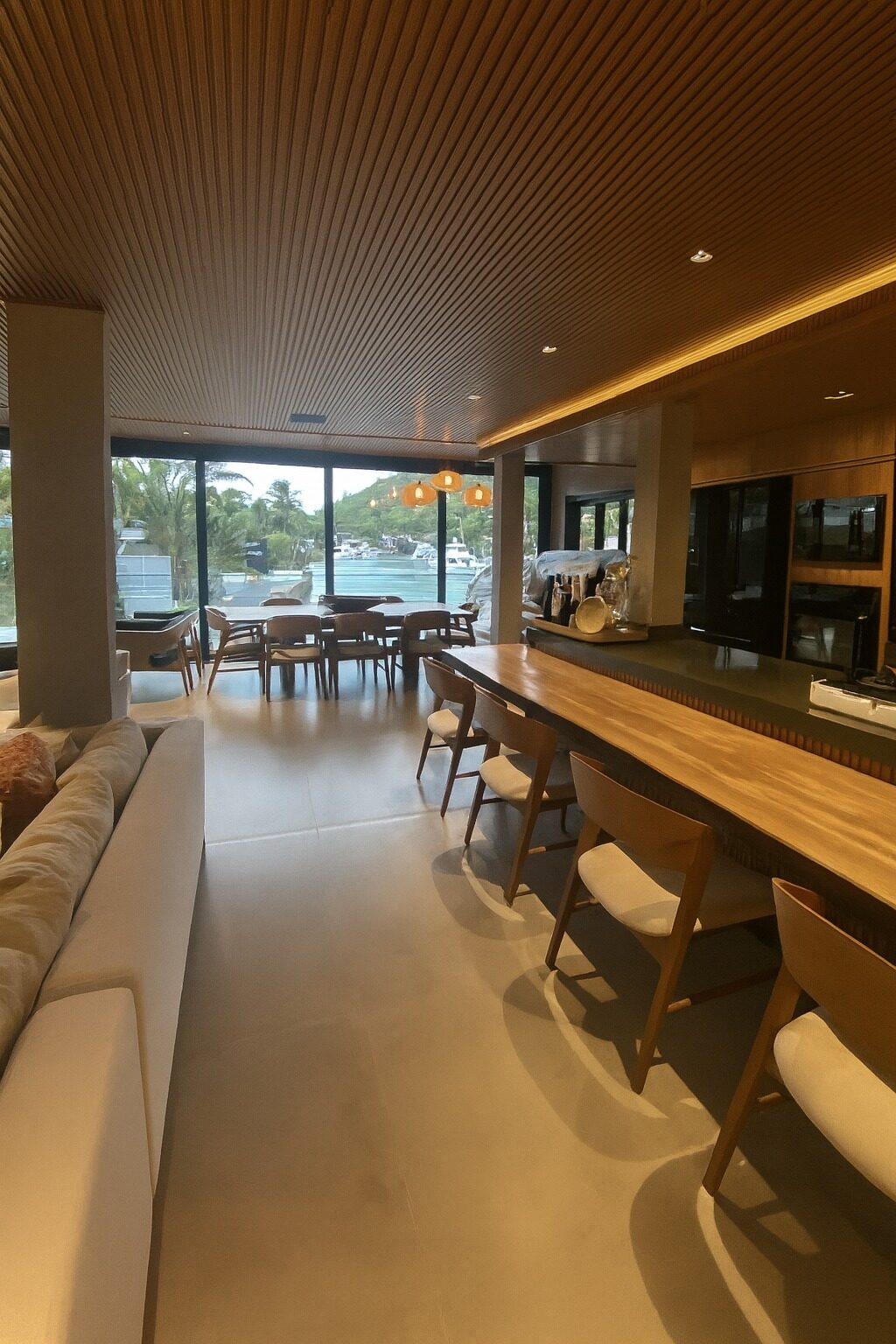 Living room and kitchen with slatted ceiling