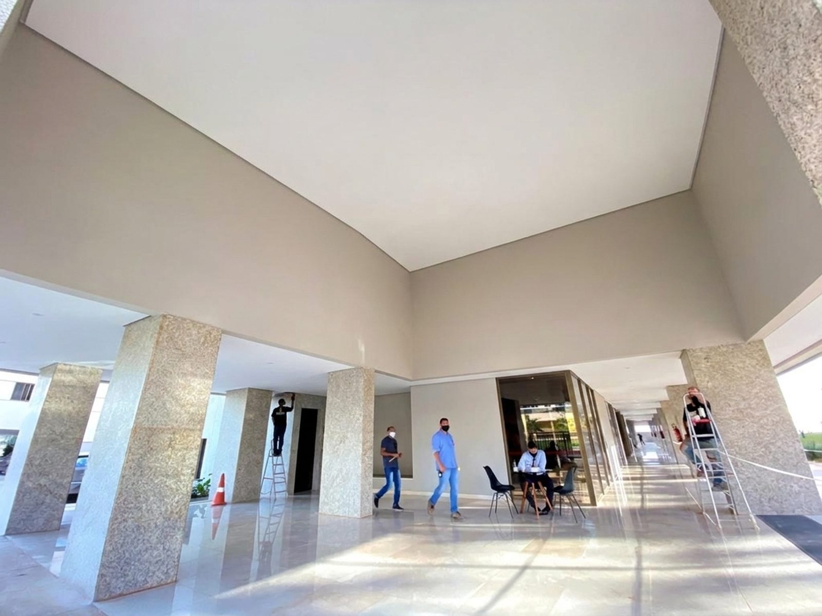 Lobby with ceiling and panels, before