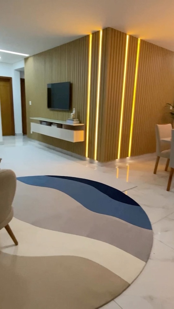 Project by Larissa Reis: TV and dining room of a rental apartment
